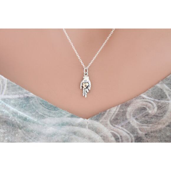 Sterling Silver Charm Hand Holding Bronze Heart Necklace - Picture 1 of 5